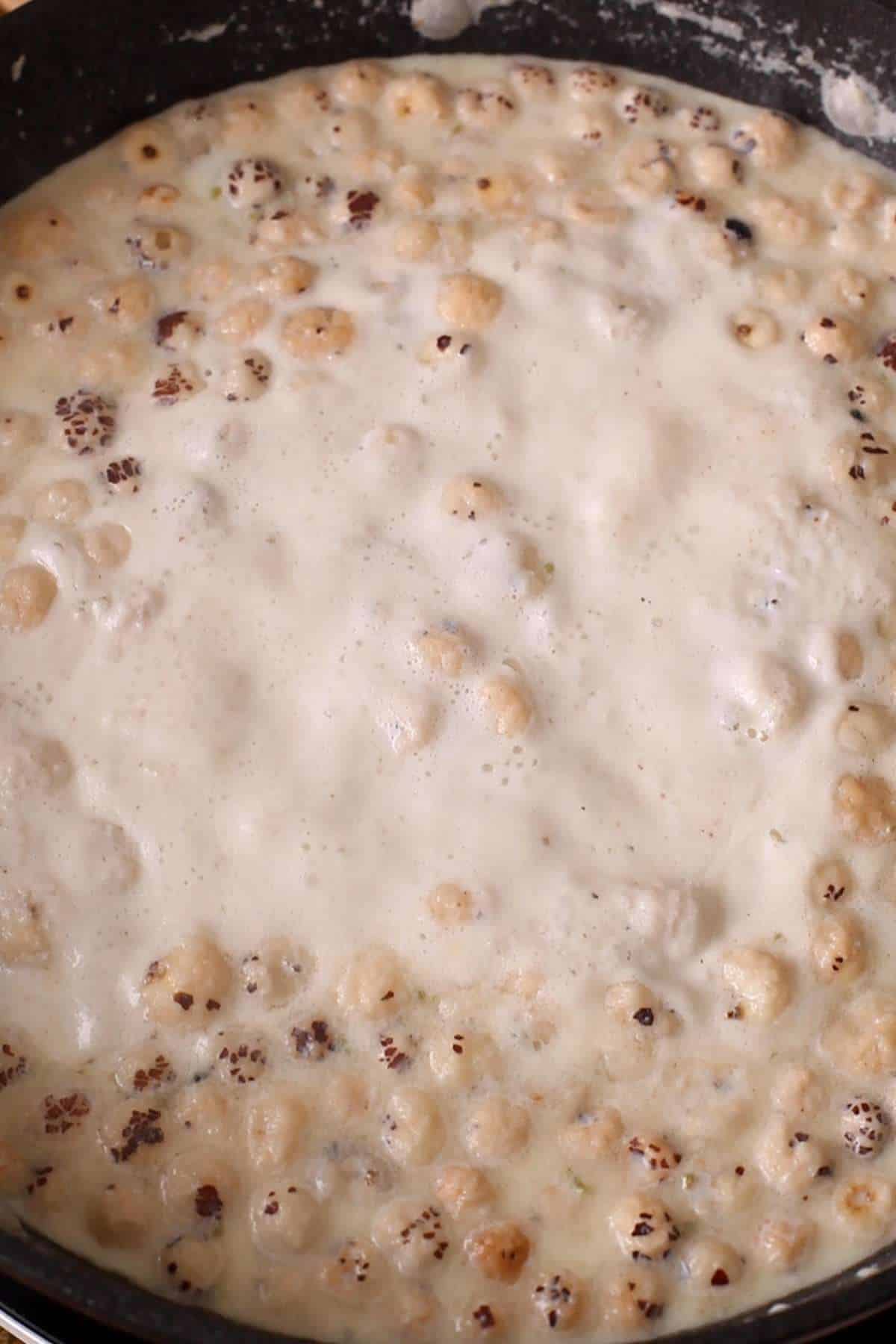 Simmering Makhane ki kheer or low heat. 