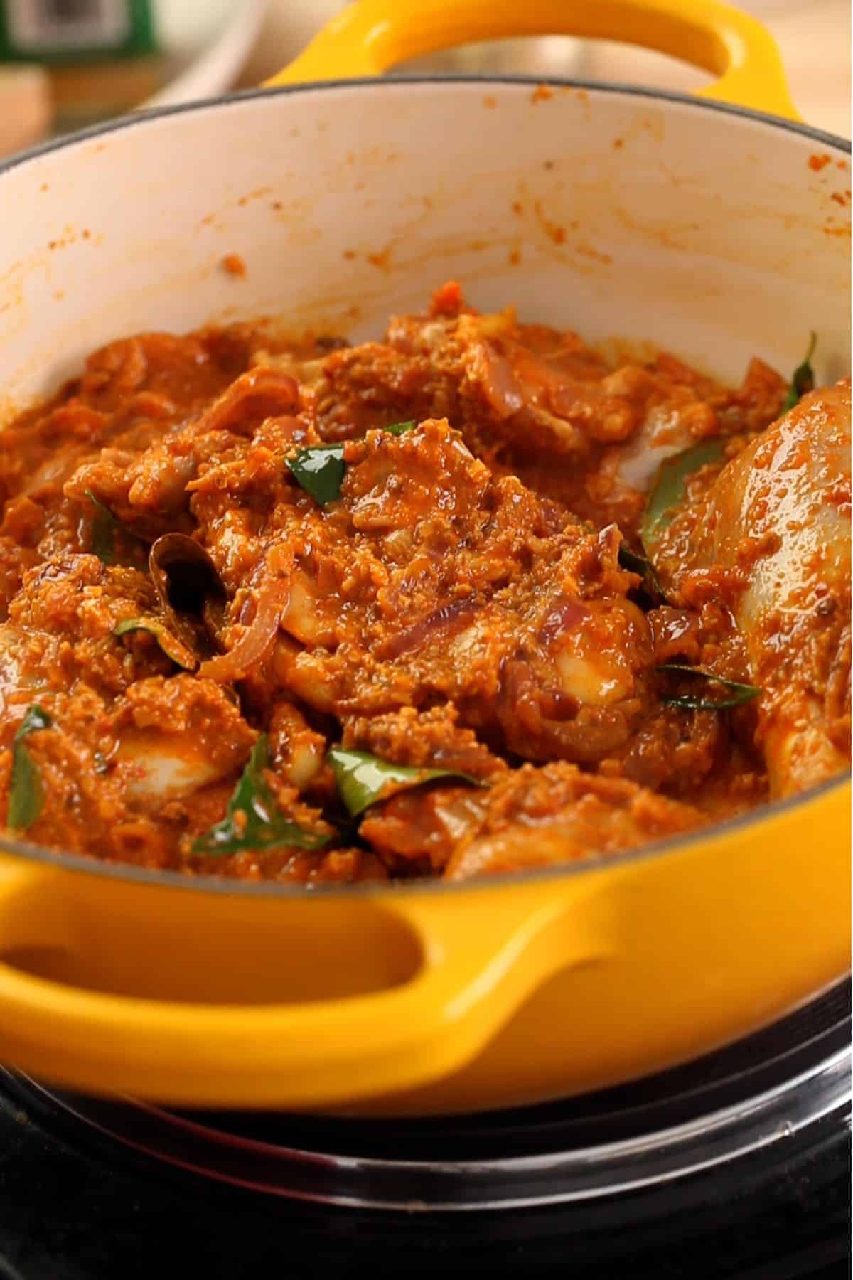 Chicken is sauteed with chettinad spice paste.