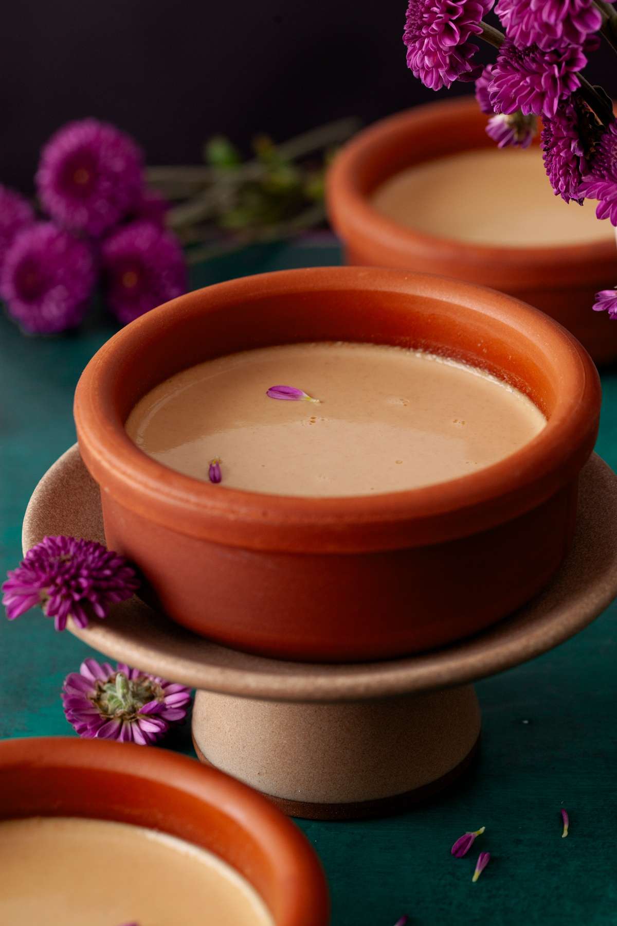 Side view of a pot of mishti doi.