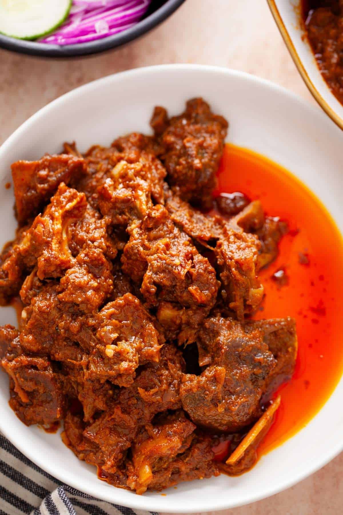 Close up image of indian style braised goat meat dish.