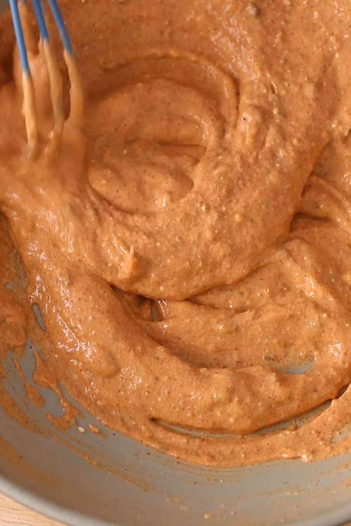 Whisking the marinade for tandoori lamb kebab. 