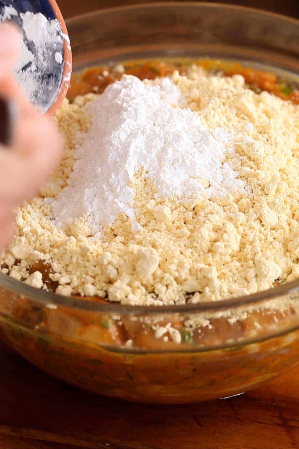 Add the besan and rice flour.