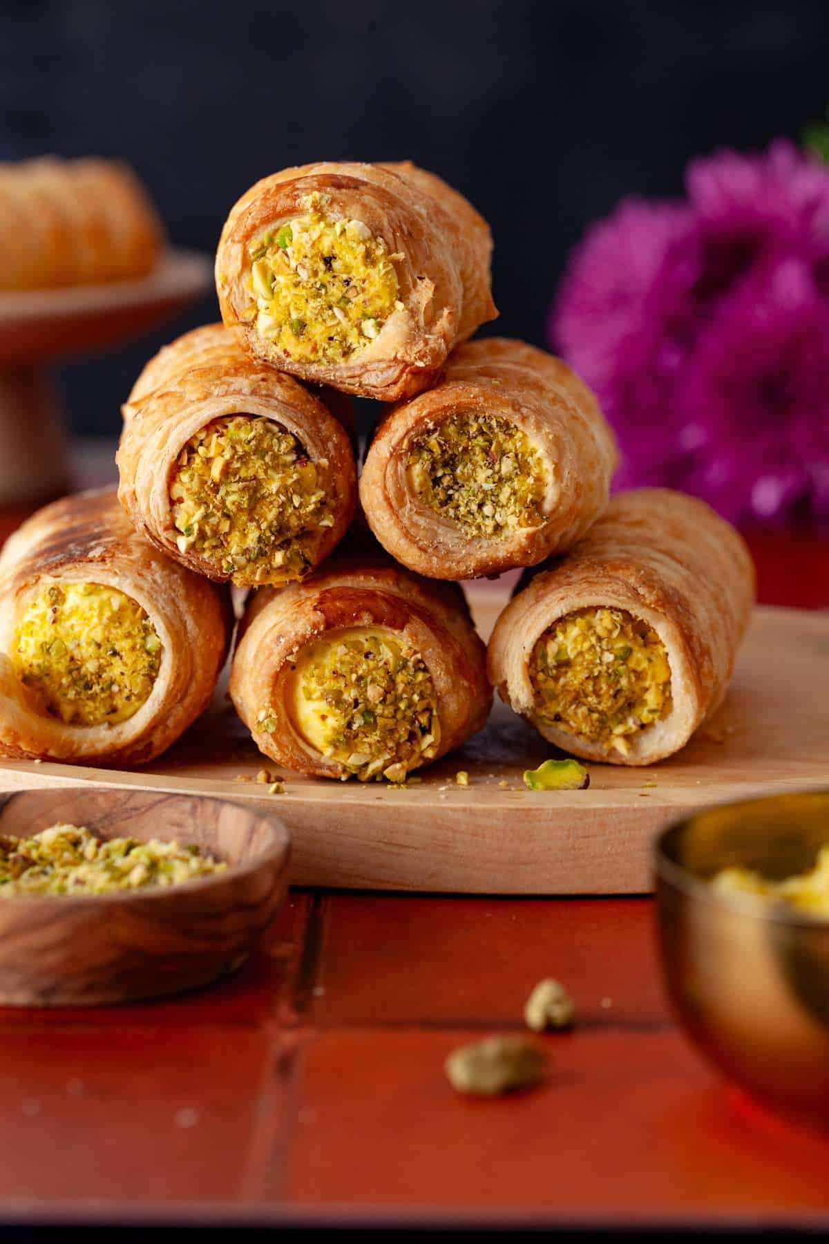 Cream Roll placed on a wood plate.