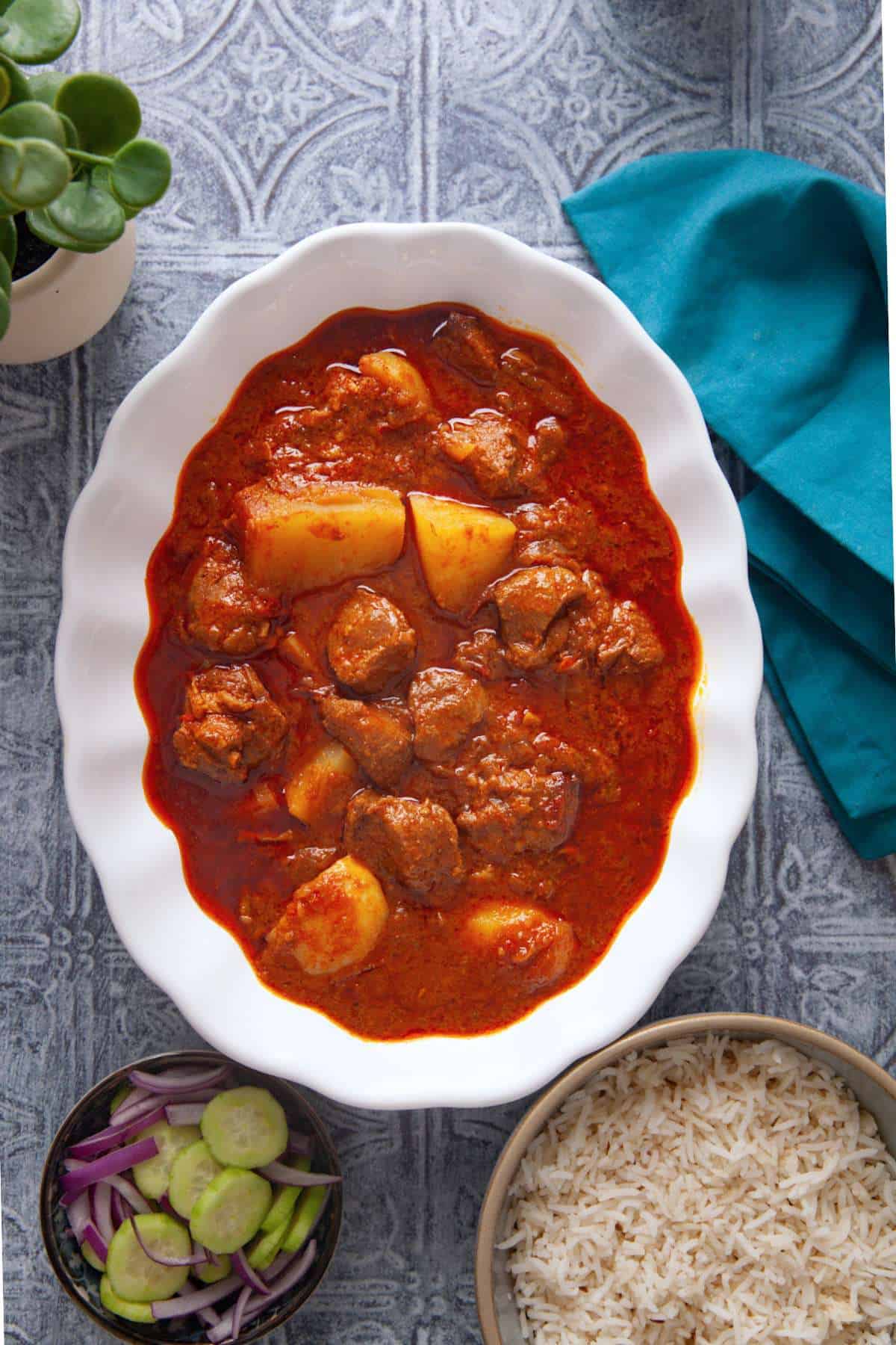 North Indian style aloo gosht served with cumin rice. 