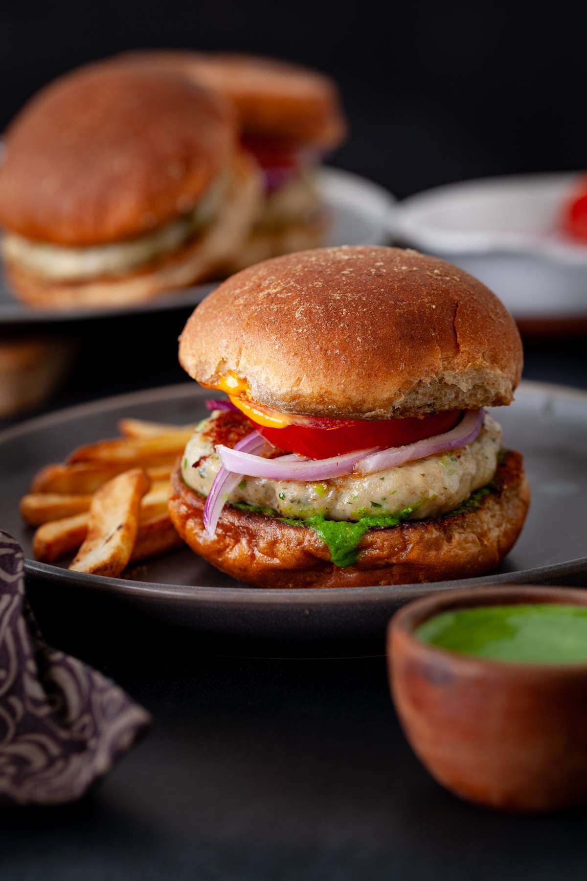 Spicy Chicken Burgers served with fries.