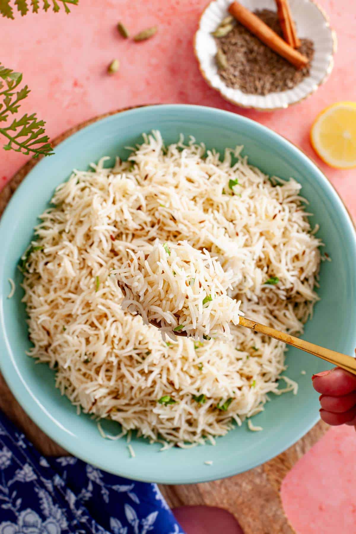 Indian cumin rice in a spoon. 