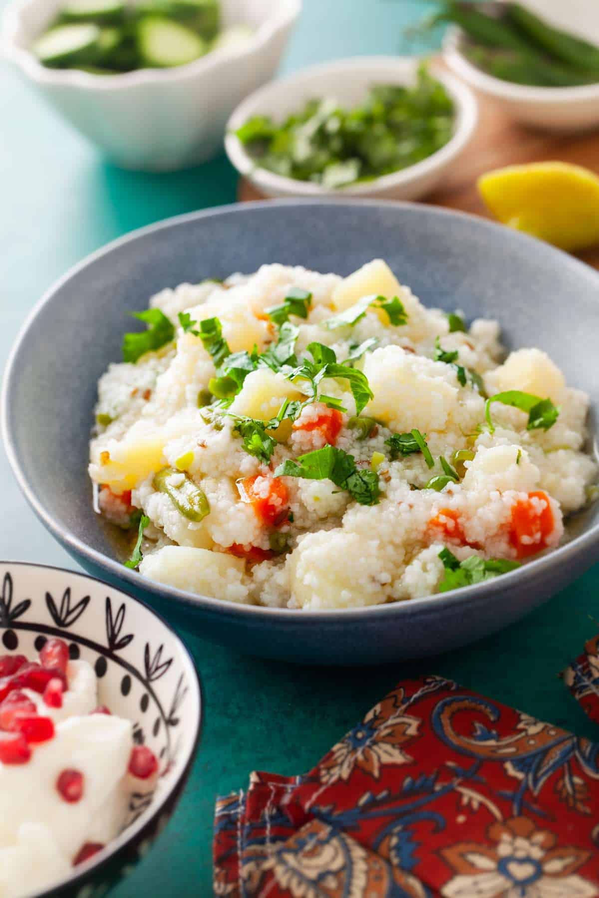 Sama Rice Pulao in a ble bowl with garnish of coriander leaves.