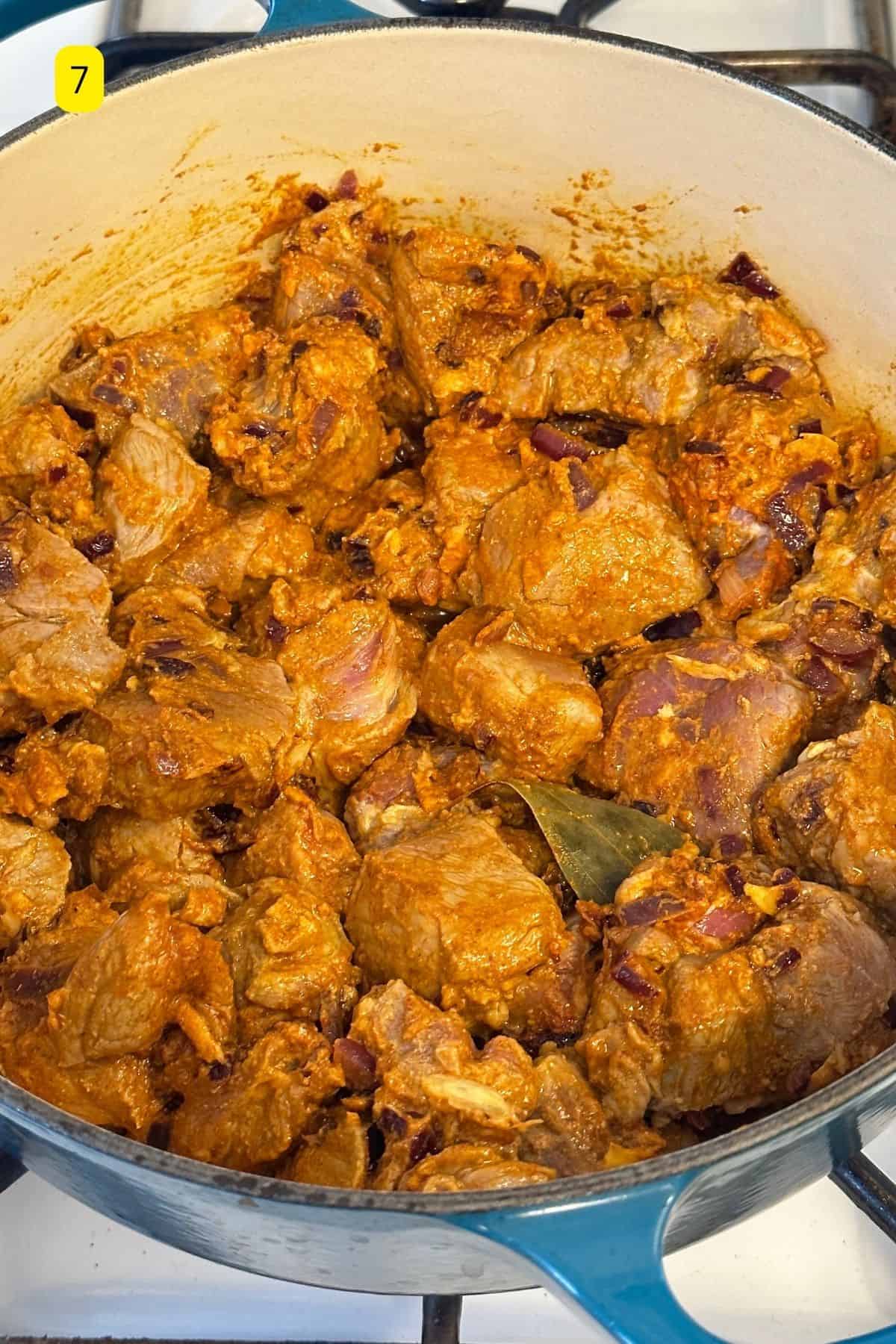 Mix the lamb to coat well.