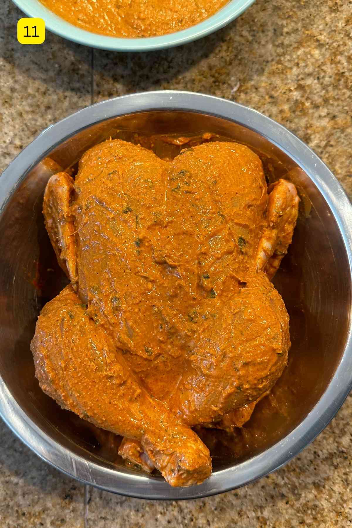 Whole tandoori chicken ready for marination.