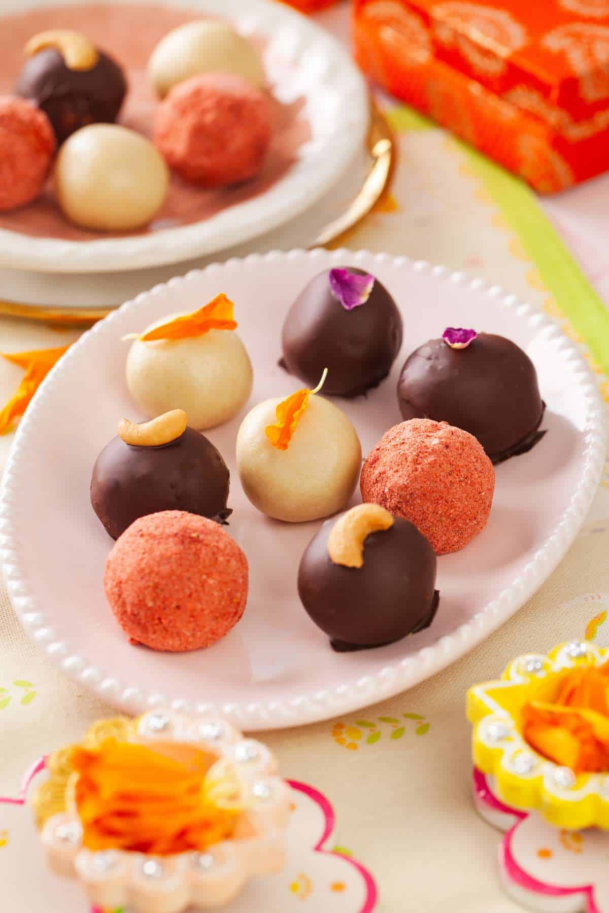 Side view of kaju katli truffles. 