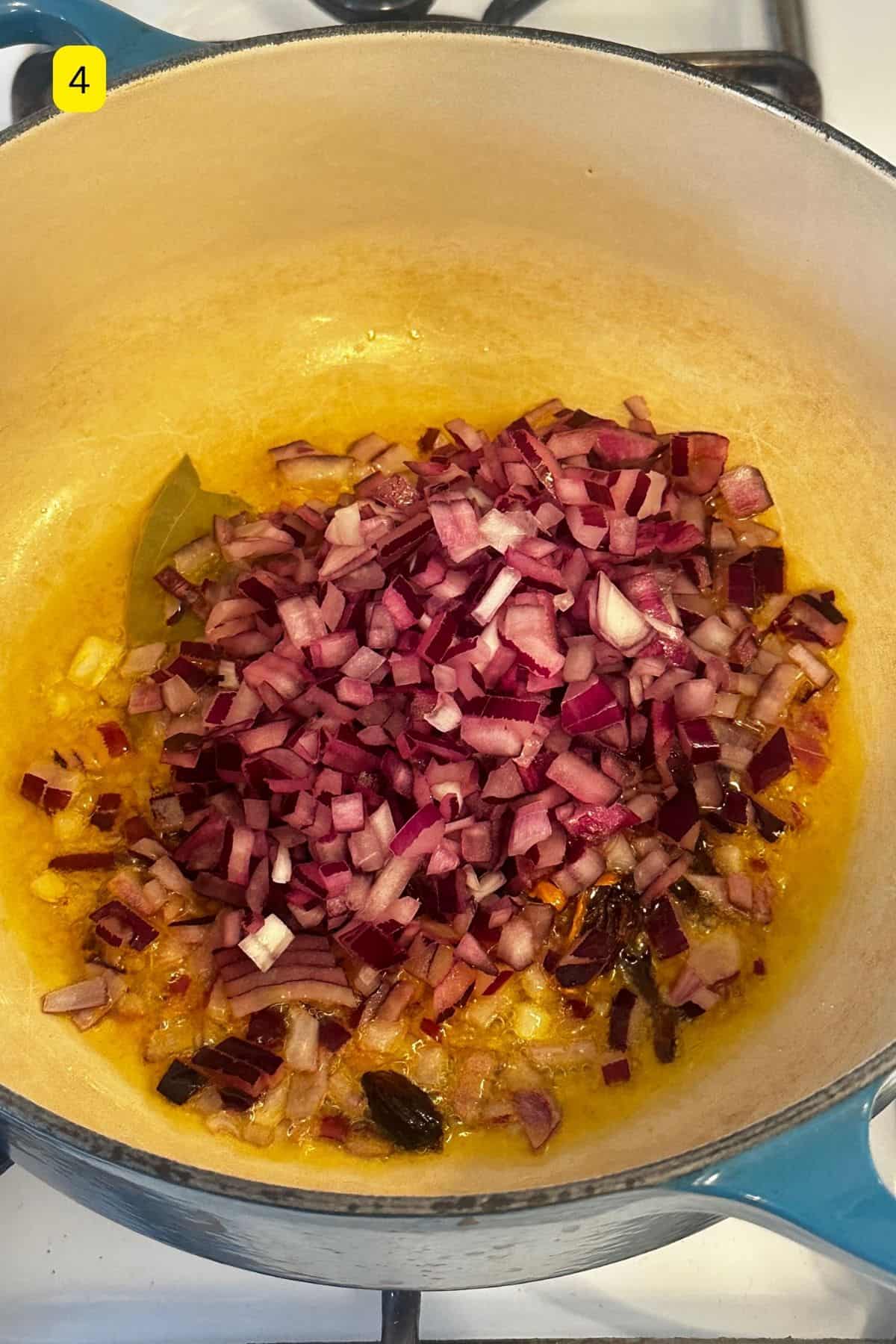 Chopped onions added to mustard oil.