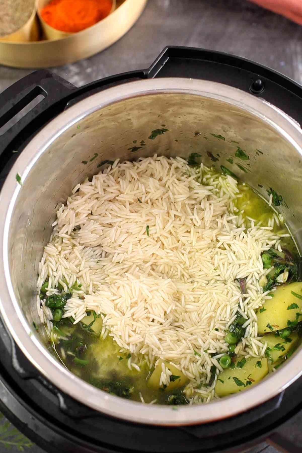 Add rice and water next to make pulao.