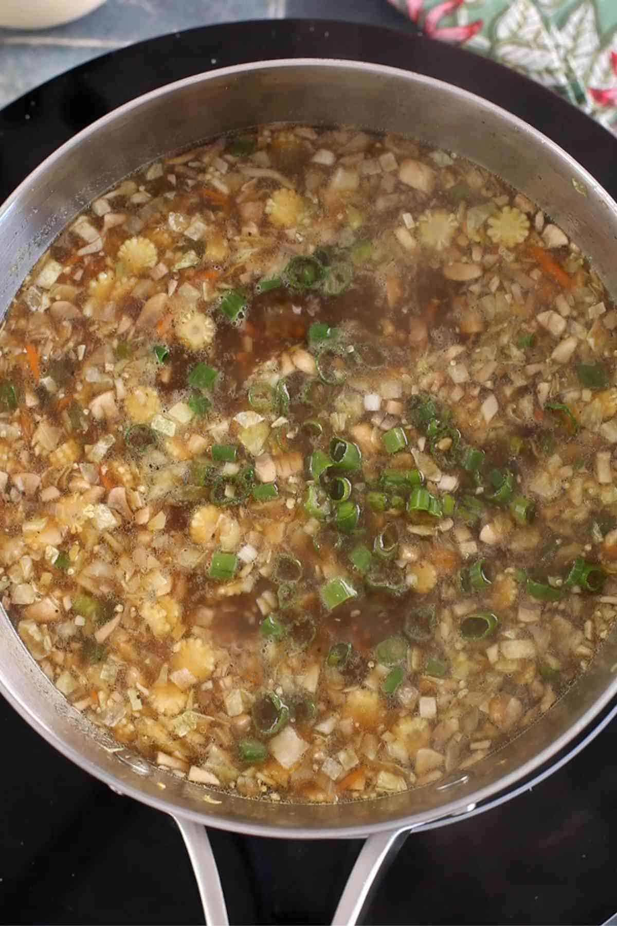 Add cornstarch mixture and simmer the manchow soup.