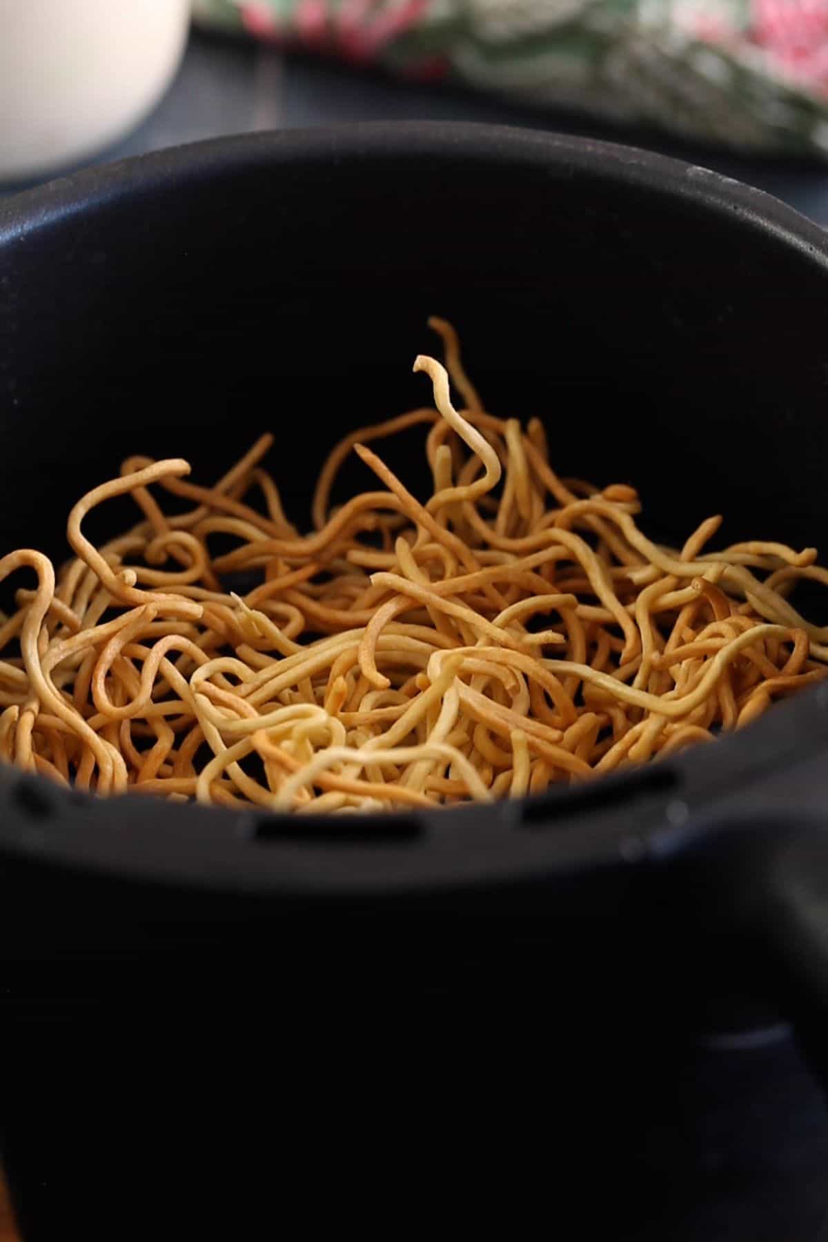 Crispy noodles after air frying.
