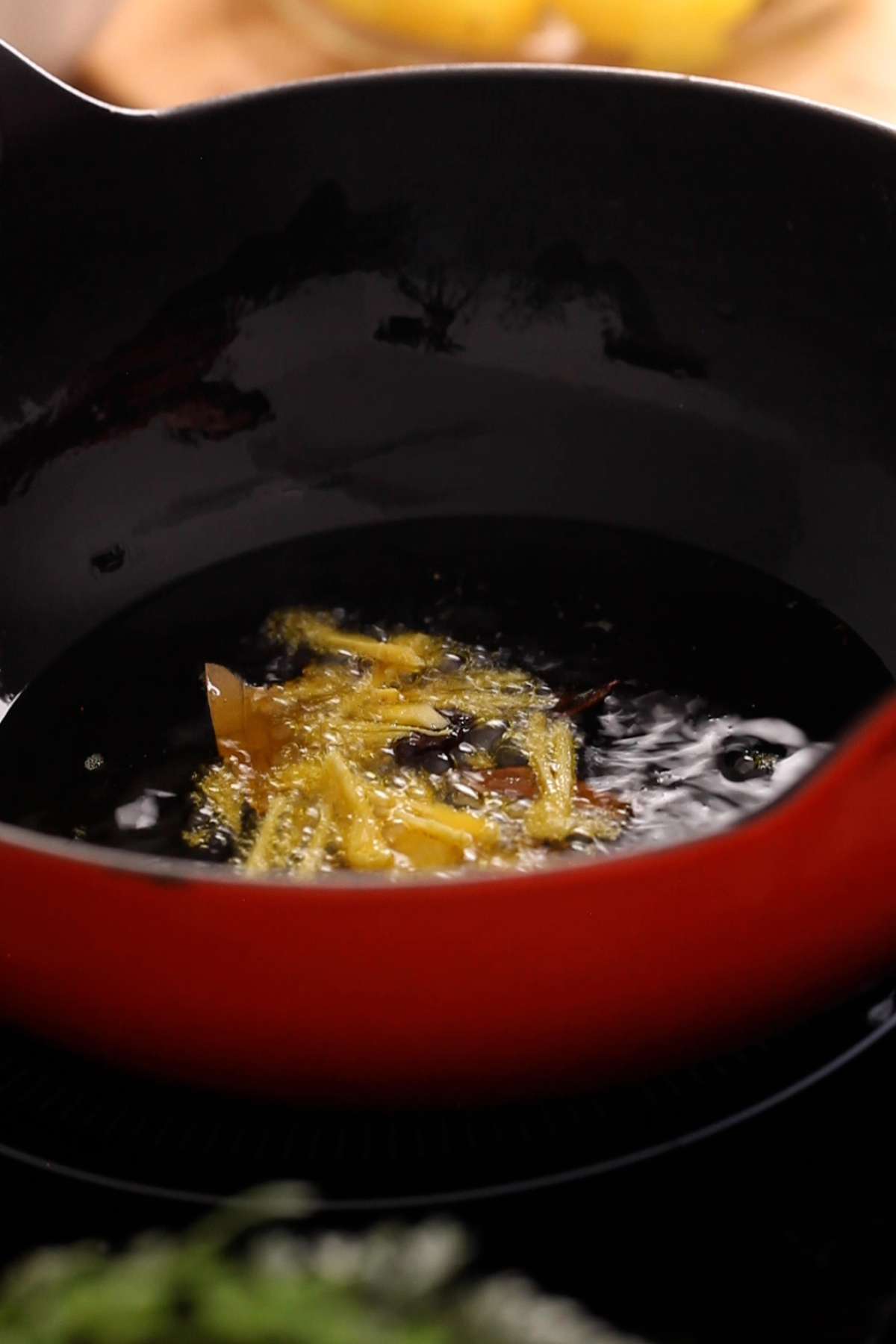 Hot mustard oil tempered with whole spices and ginger.