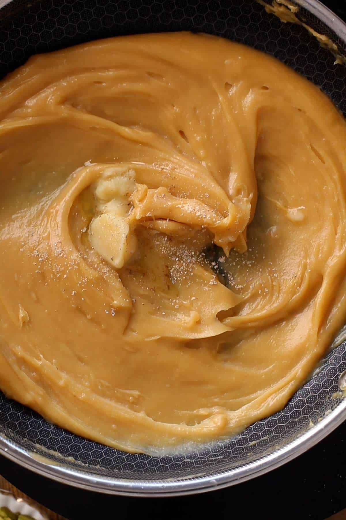 Also add the green cardamom powder and additional ghee.