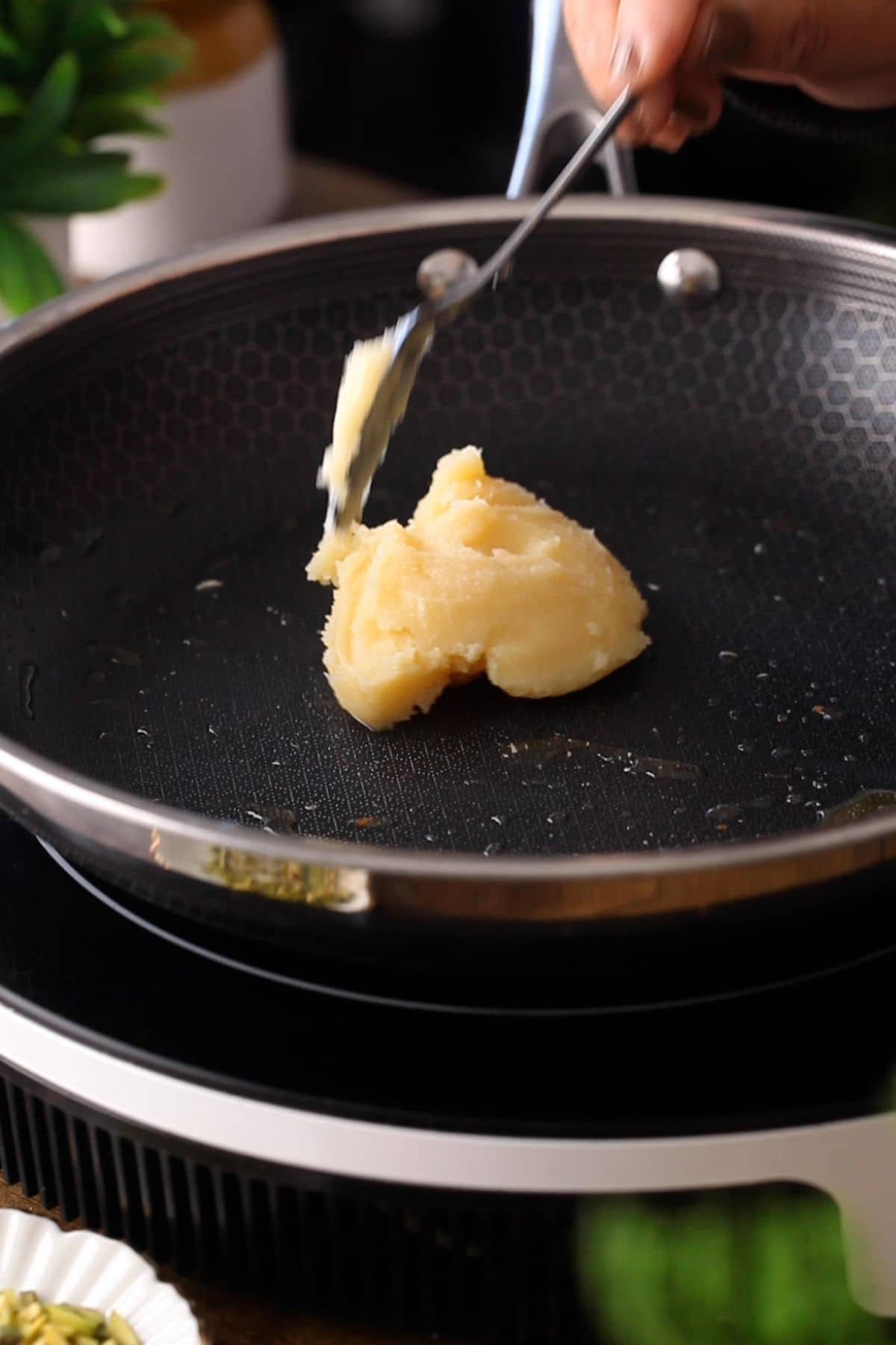 Ghee added in a non stick pan.