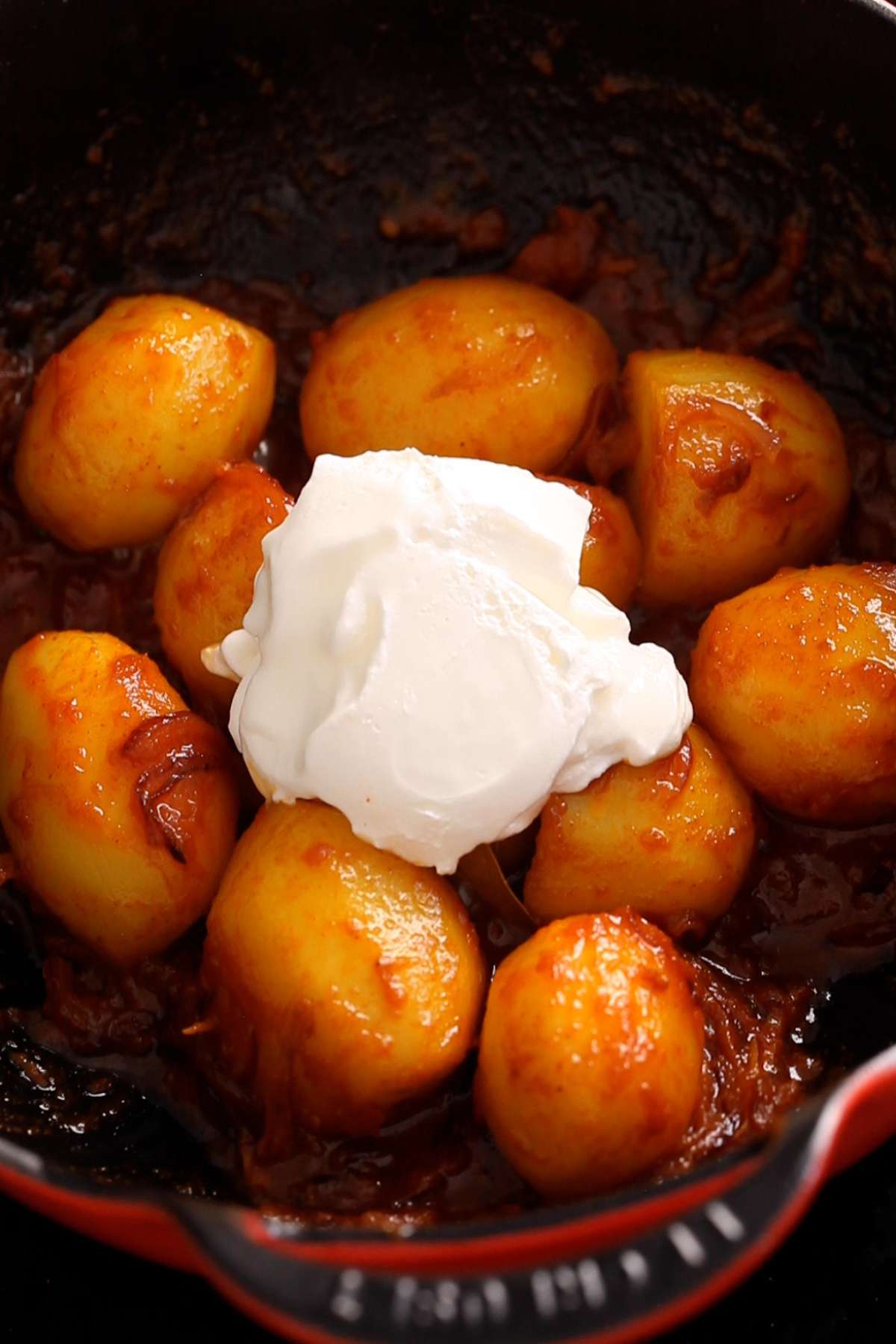 Next add the beaten yogurt to the pot.