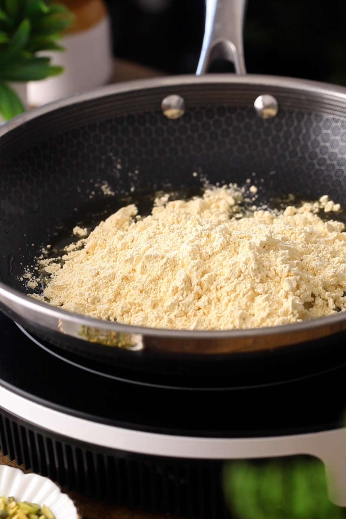 Next, add the gram flour. to the ghee.