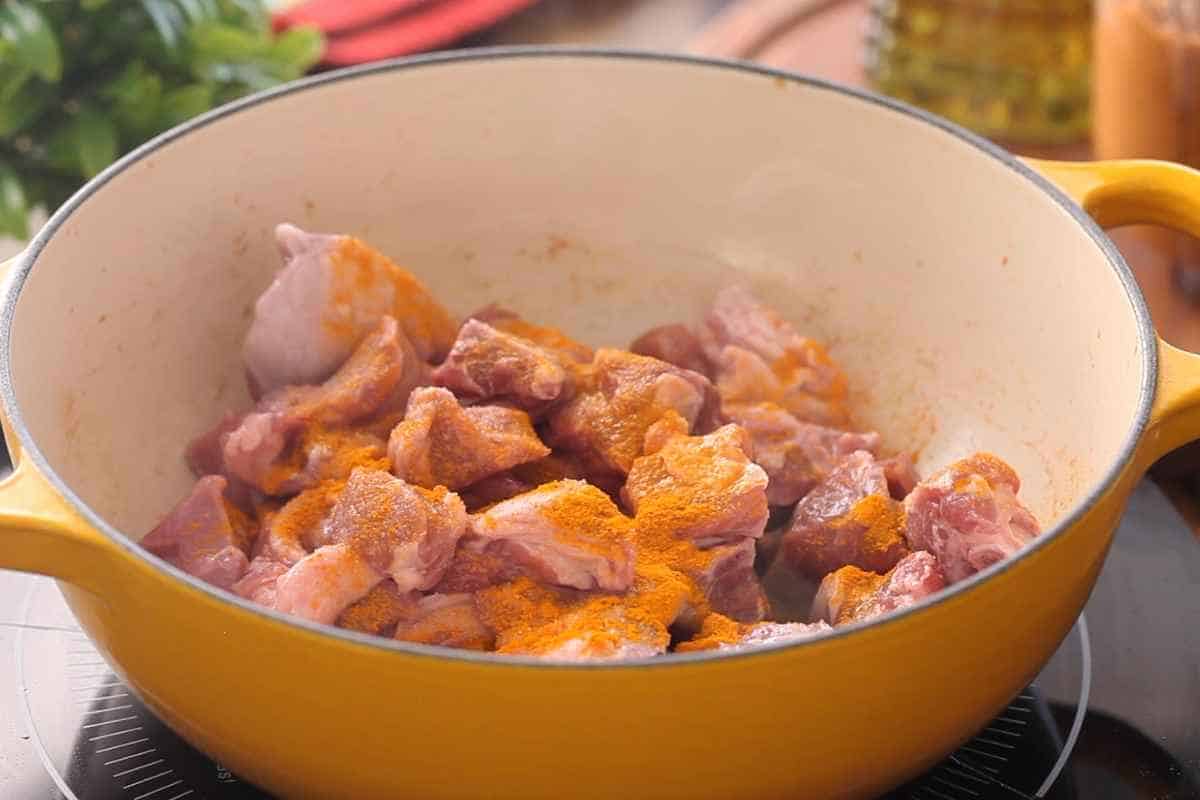 Add lamb, salt and turmeric powder. 