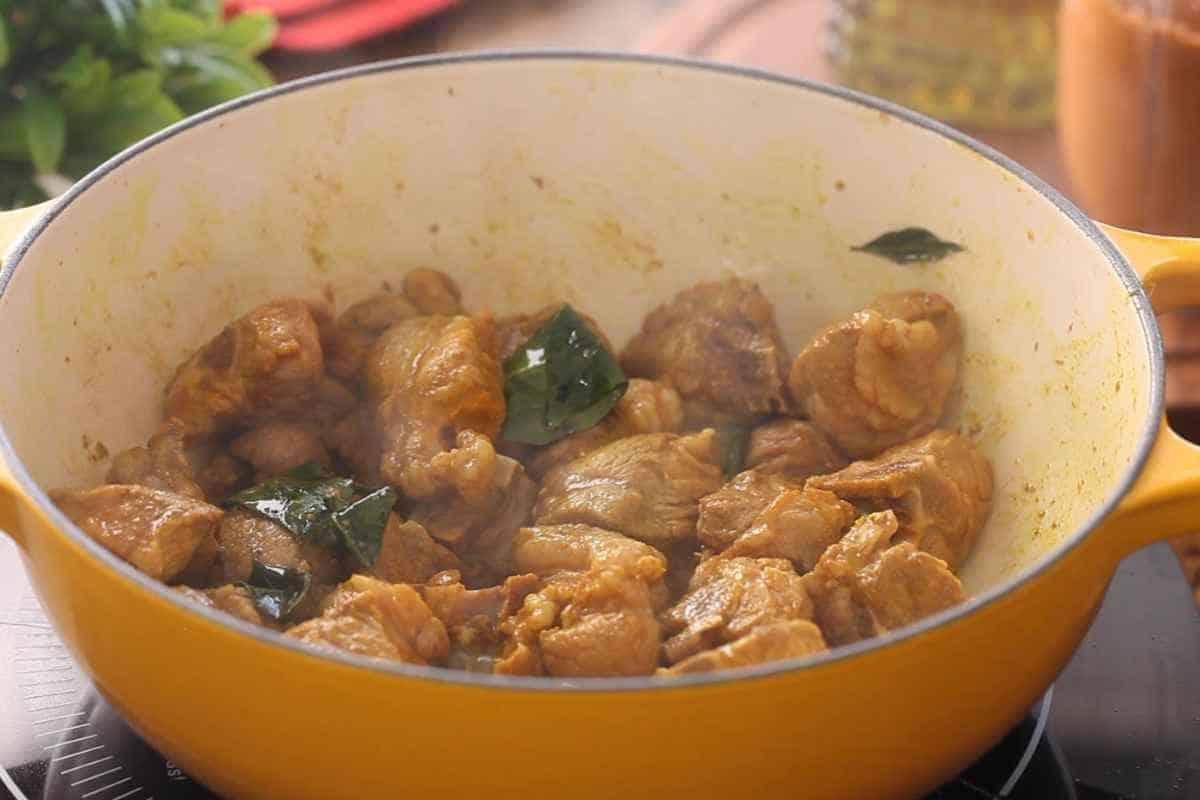 Fry lamb in oil until no pink meat is visible.