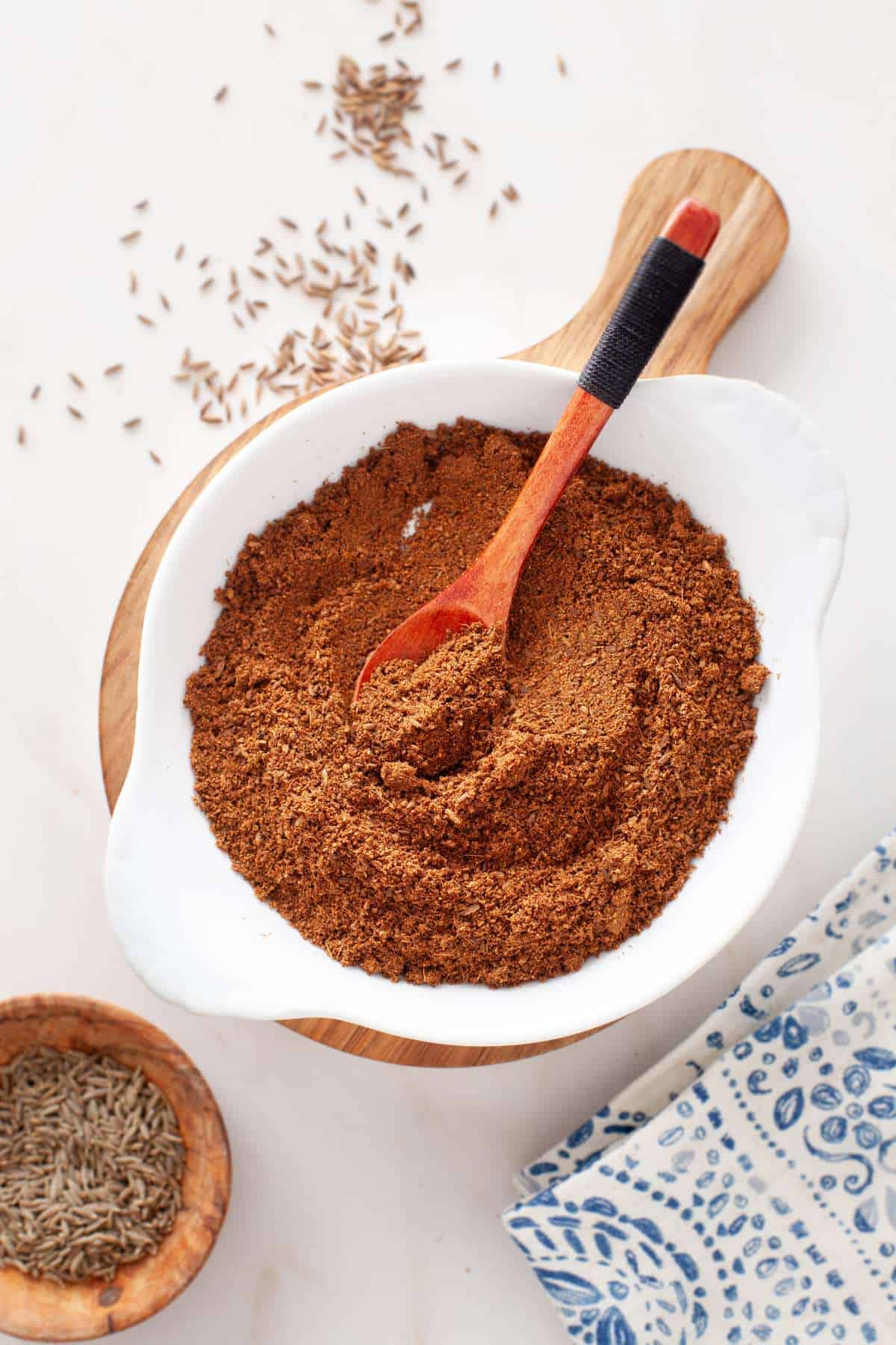 Roasted Cumin Powder in a shallow white bowl. 