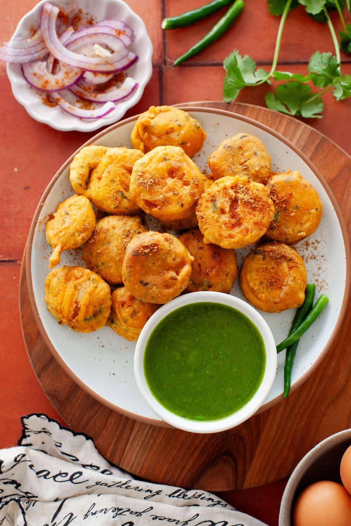 Egg pakoras served with green chutney.