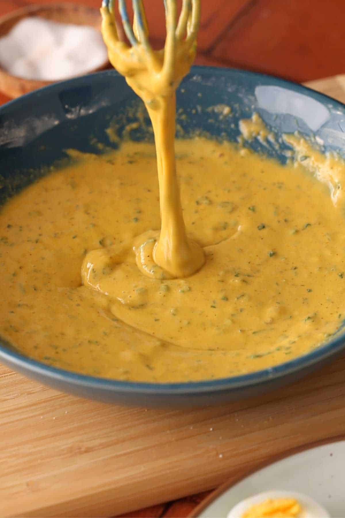 Smooth and thick flowing pakora batter.