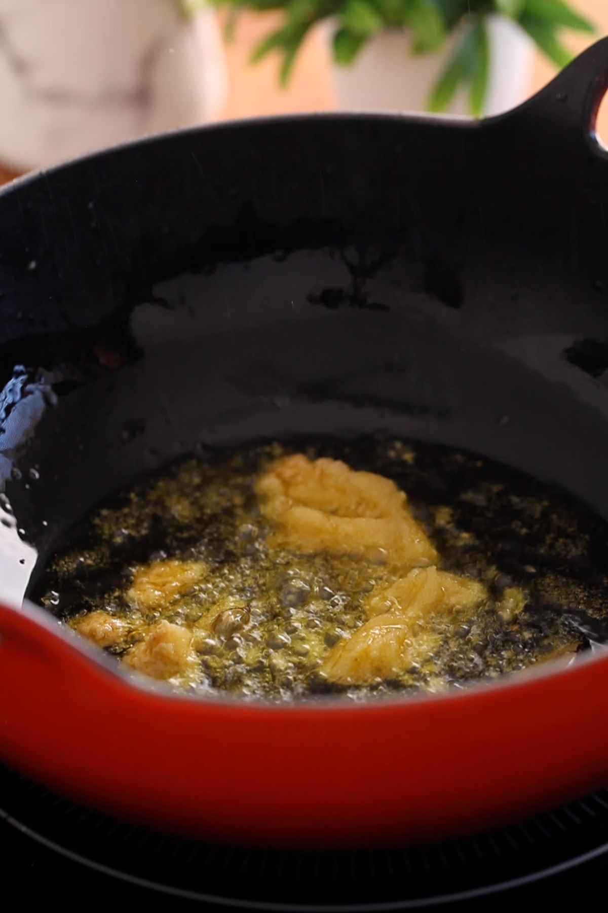 Ginger and garlic paste sizzling in hot oil.