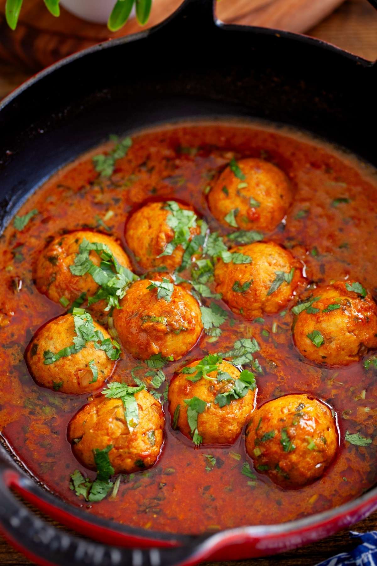A close up view of indian chicken meatball curry.