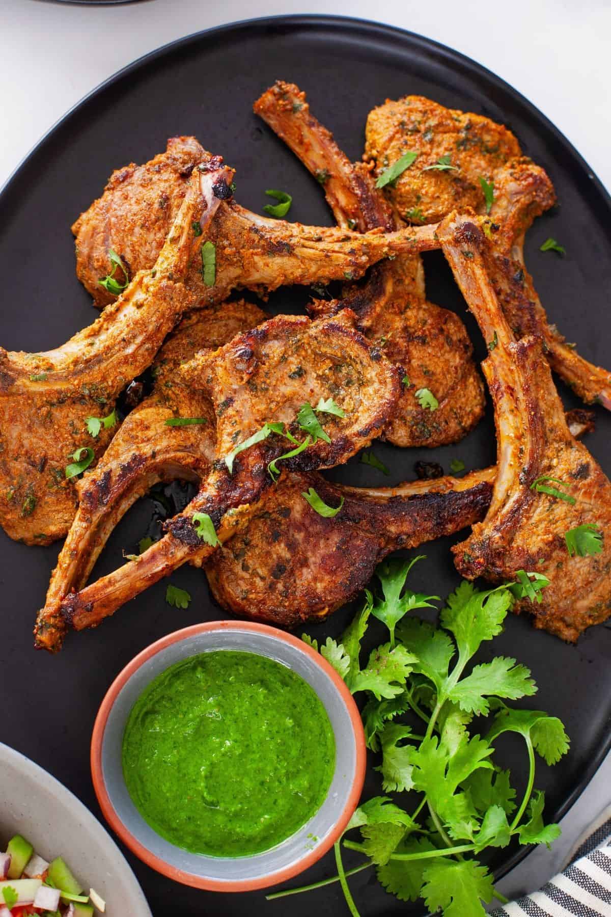 Closeup image of tandoori lamb chops.