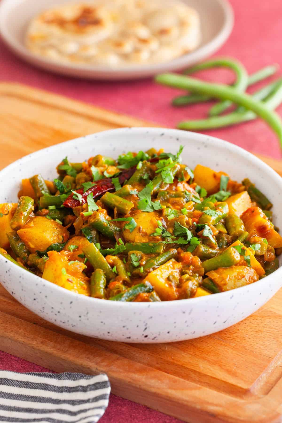 Side view of aloo green beans sabji.