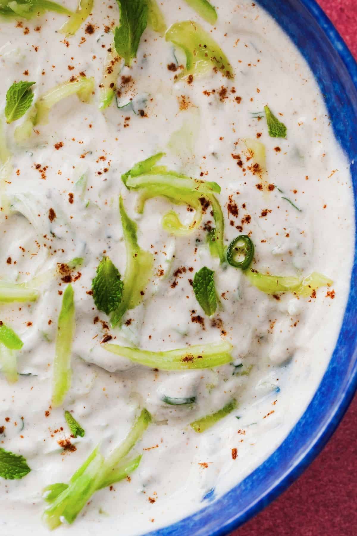 Closeup view of kheera raita.