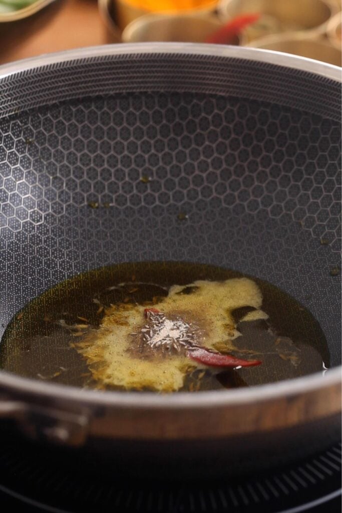 Mustard Oil tempered with whole spices.