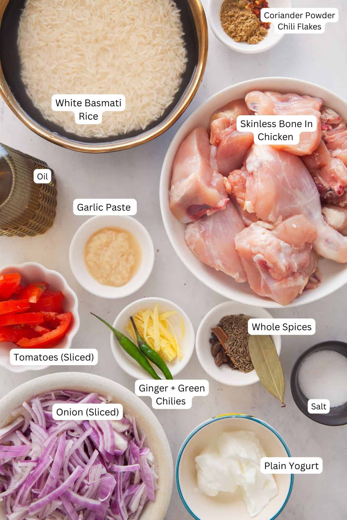 Ingredients for making chicken pulao.