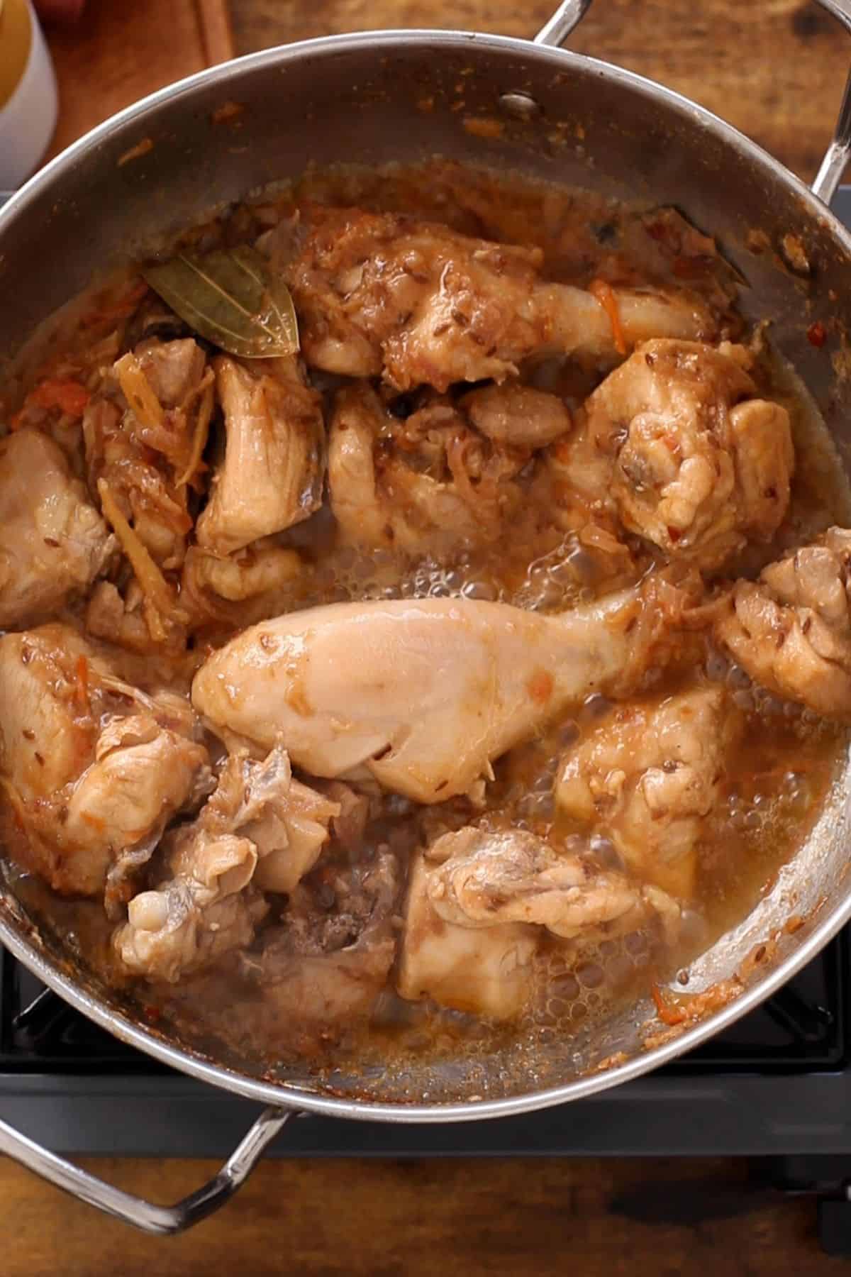 Yogurt and chicken are sauteed together.