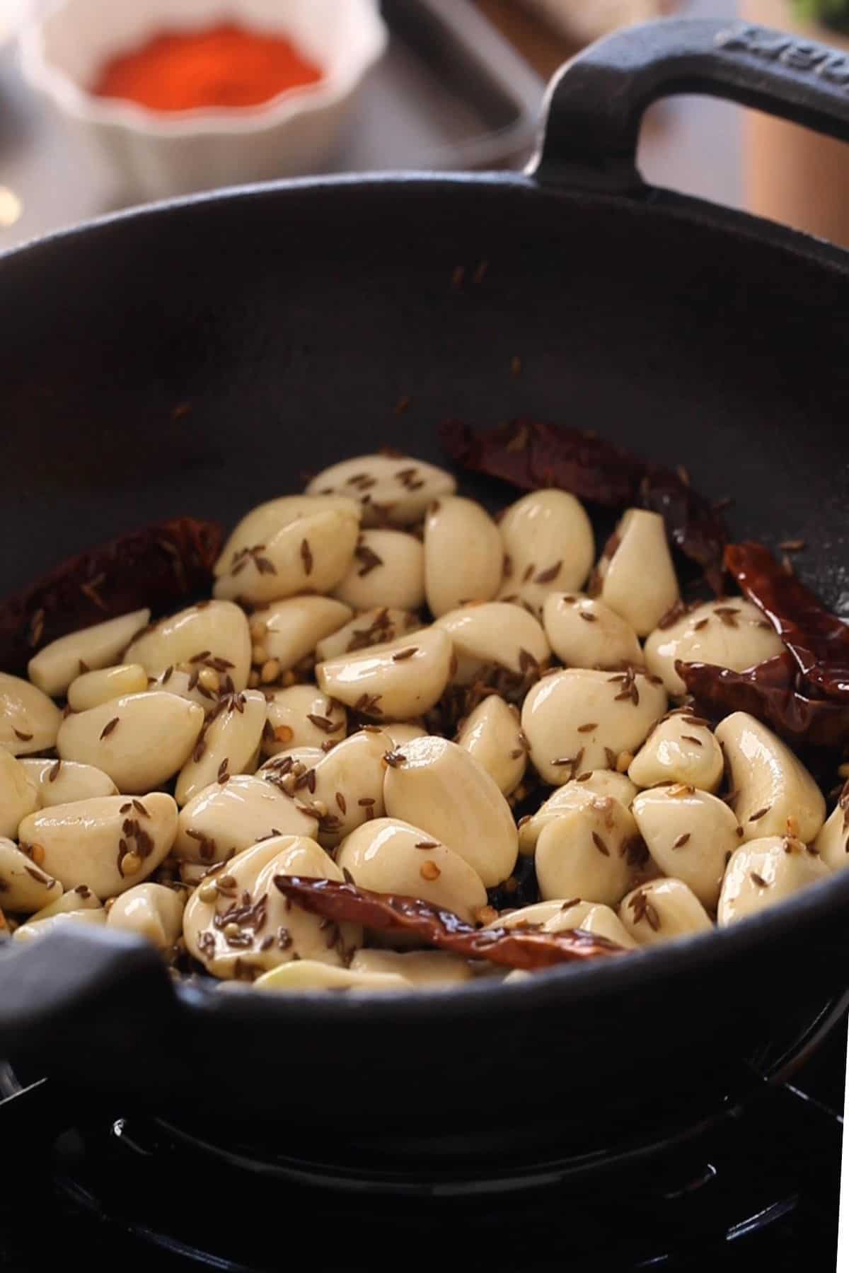 Roasting garlic for making chutney.