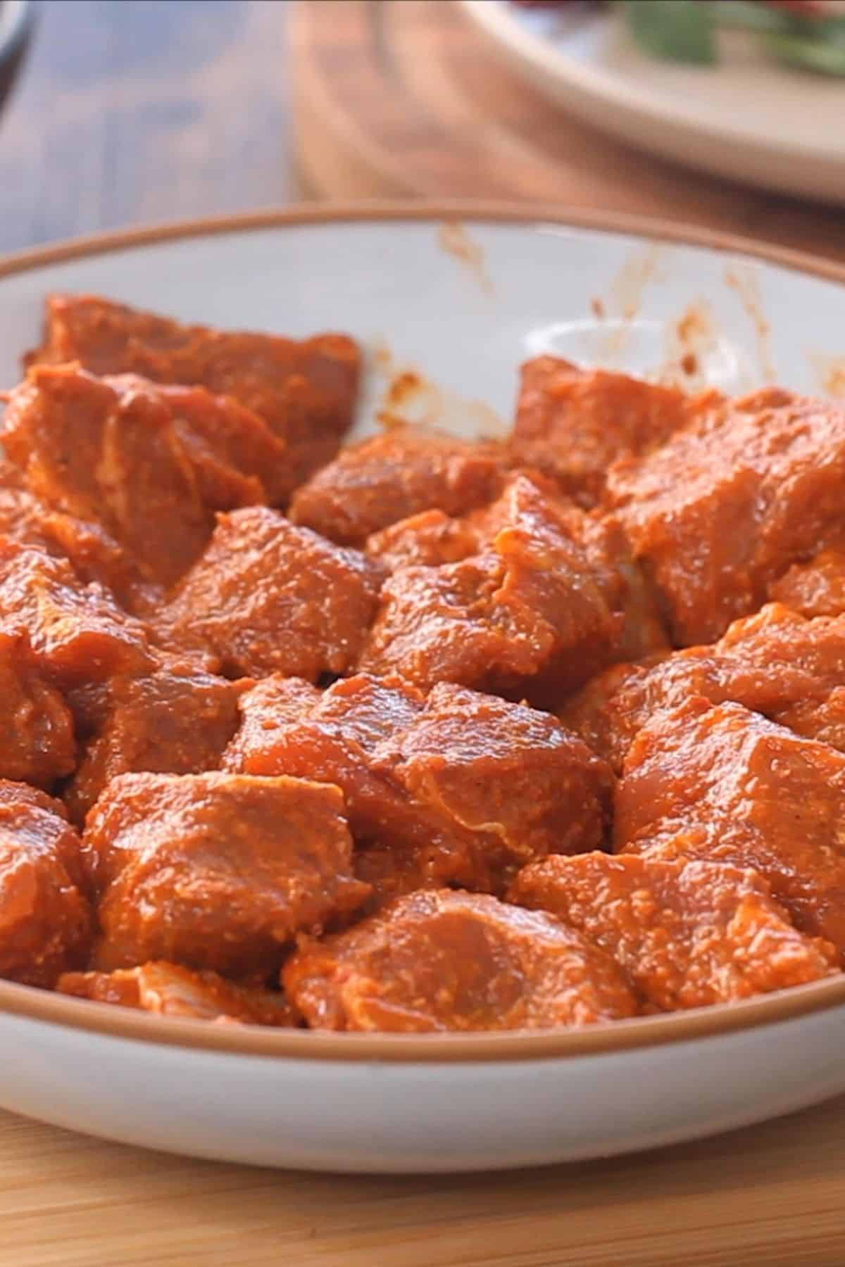 Boneless lamb marinated in the fresh vindaloo marinade and vinegar.