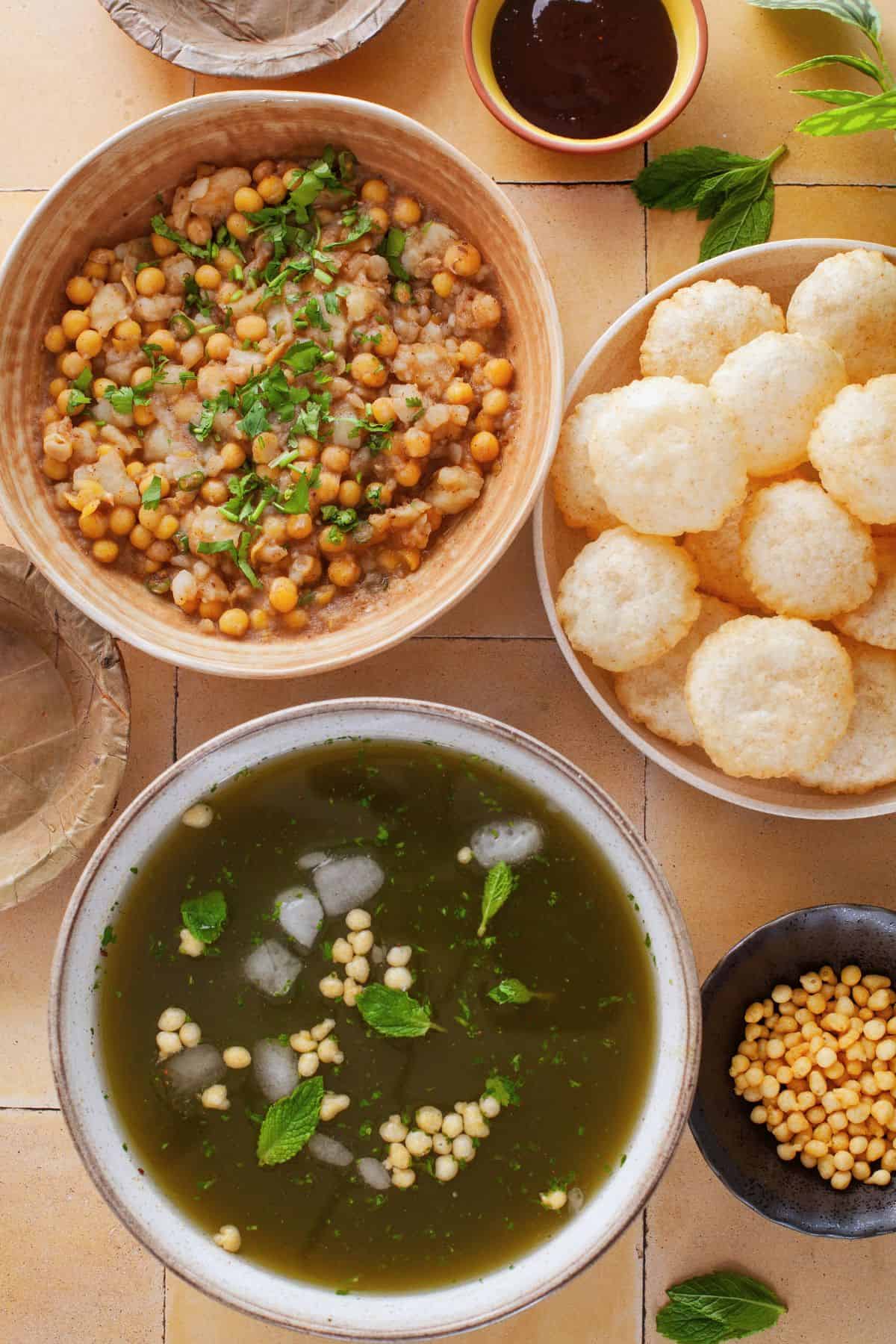 Golgappa served with potato stuffing, tangy pani puri water and tamarind chutney.