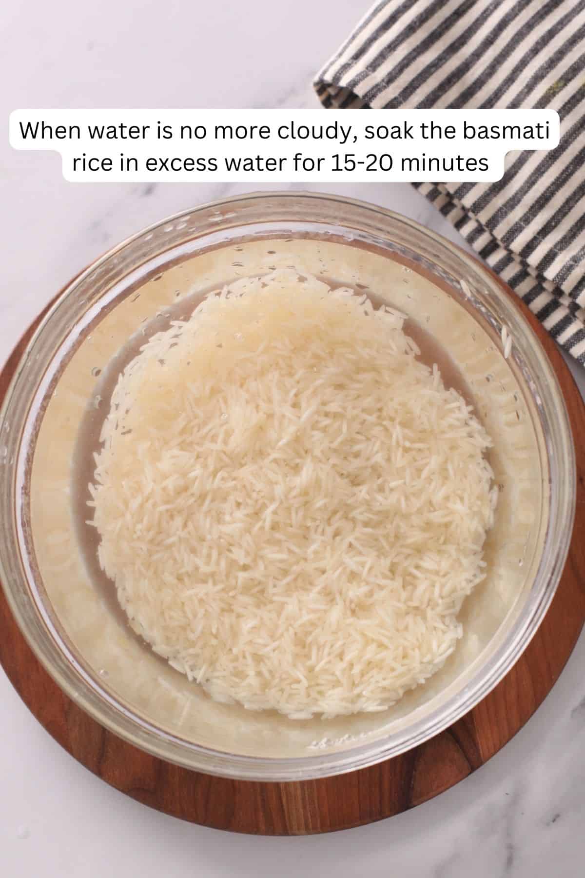Soaking rice in excess water.