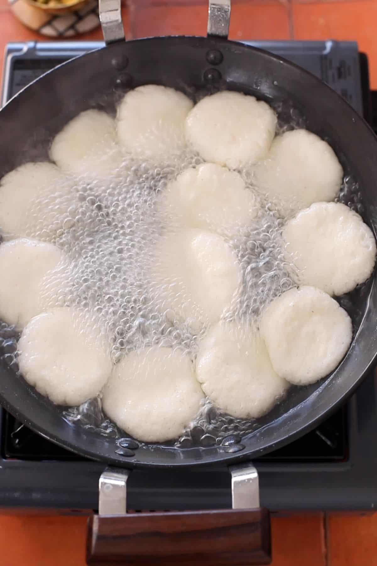 Rasmalai patties doubling in size after boiling in syrup.