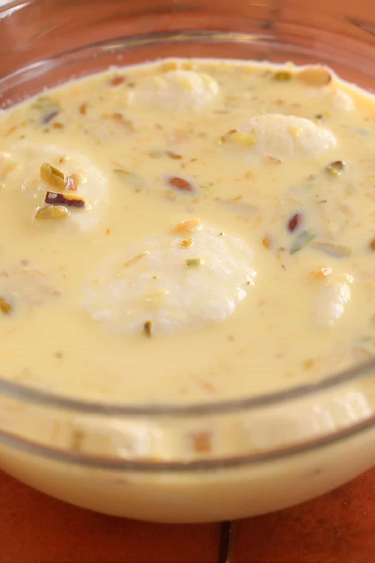 Soak the rasmalai balls in the rasmalai milk.
