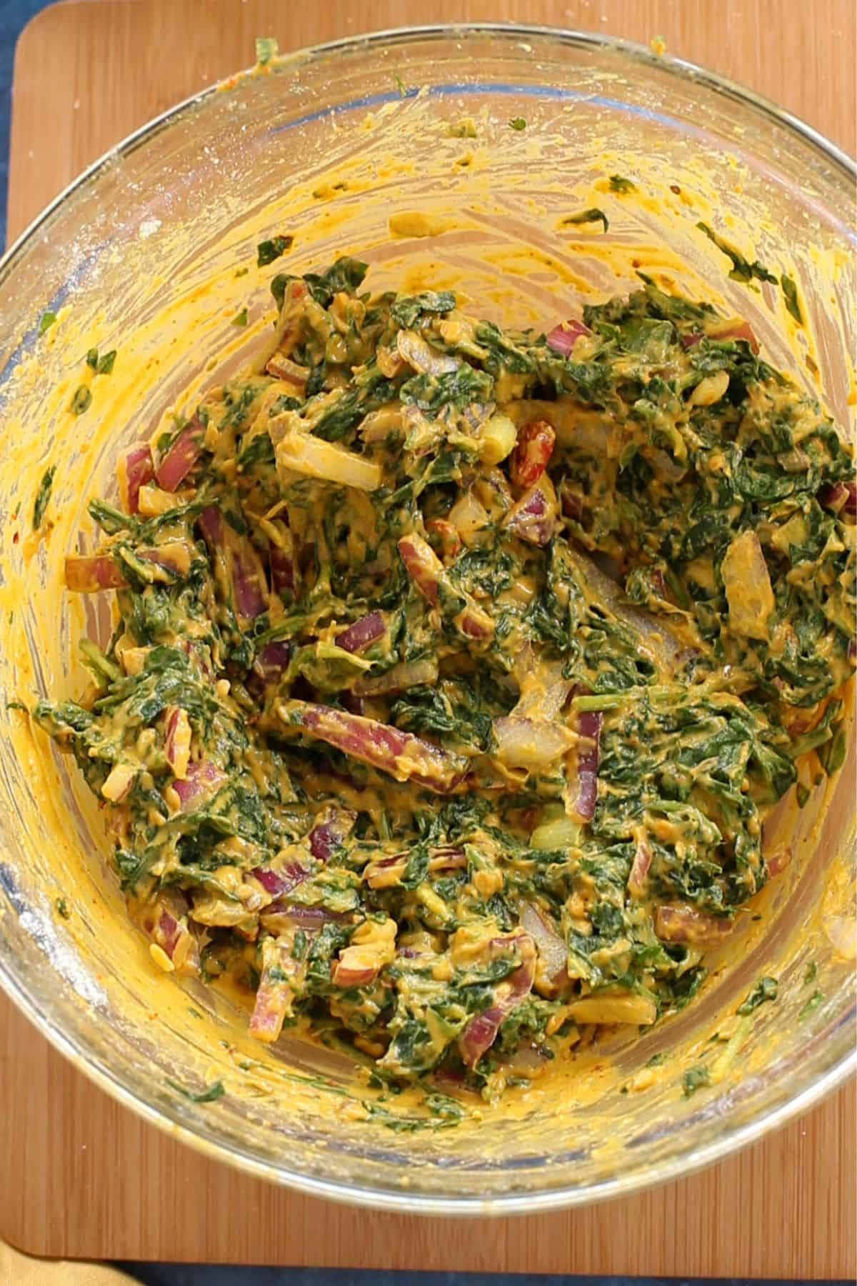 Spinach pakora batter is resting.