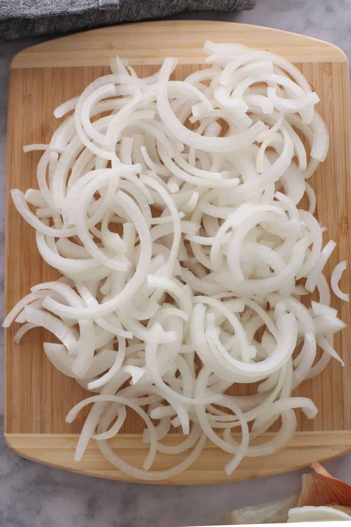 Slices of onions are seperated. 