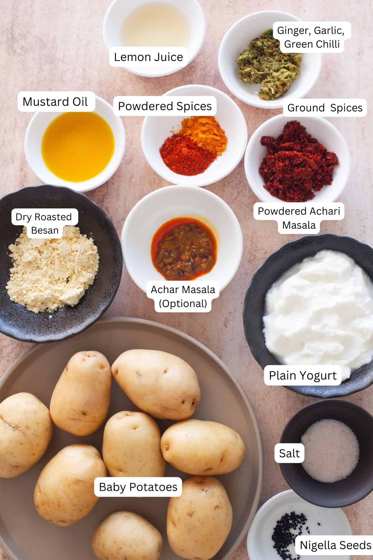 Ingredients needed for making achari aloo.