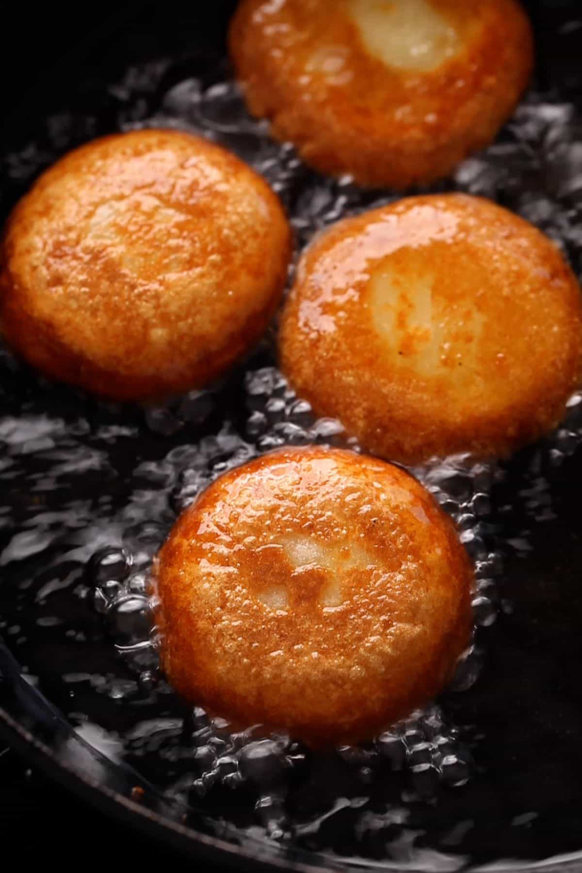 Golden brown aloo tikki after shallow frying.