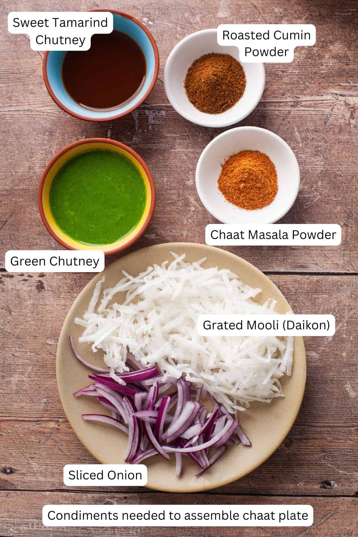 Condiments needed to make chaat plate. 