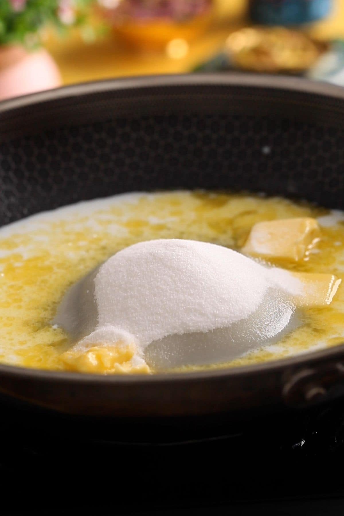 Sugar is added to milk and butter.