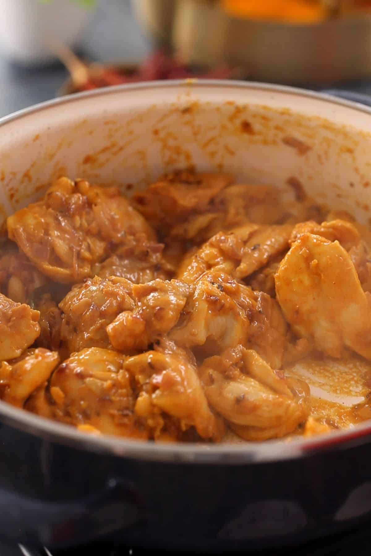 Chicken is stir fried until it's not pink.