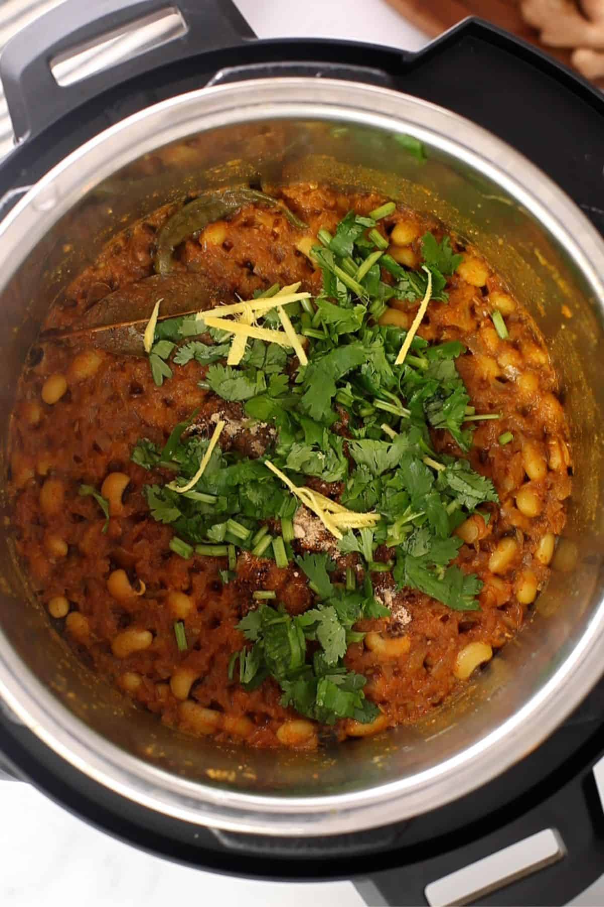 Lobia curry is ready and granished with cilantro.